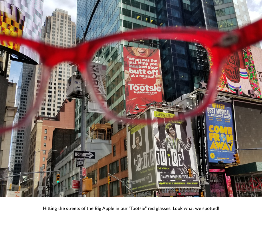 Tootsie red glasses with New York musical billboards: Tootsie, Beetlejuice, and Come From Away.