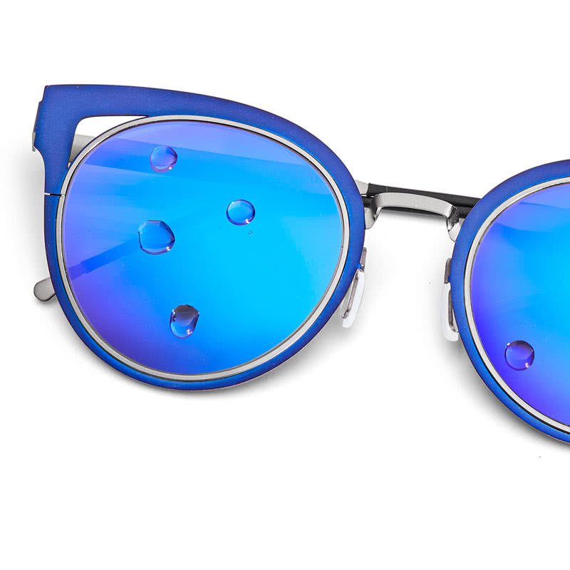 Blue cat-eye sunglasses with round blue mirrored lenses and metallic frame accents.