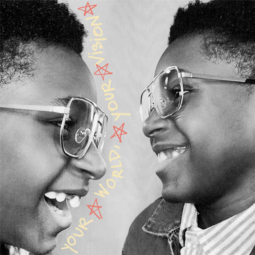 Two kids wearing glasses are smiling at each other. Text: "YOUR WORLD, YOUR VISION" with stars.