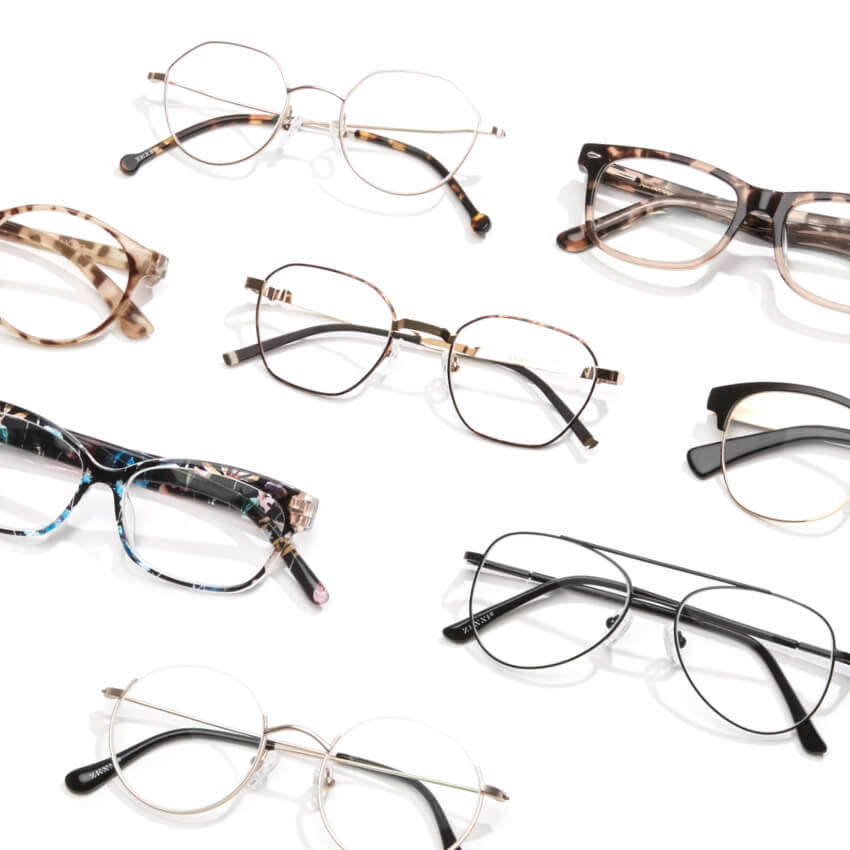 Various styles of eyeglasses, including round, rectangular, and tortoiseshell frames.